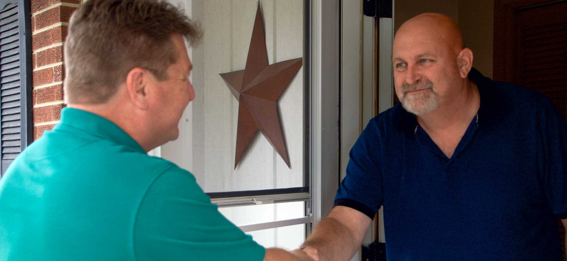 Mike-shaking-hands-with-constituent